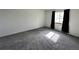 Bedroom with new carpeting and natural light at 780 2Nd St, Bennett, CO 80102