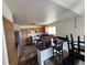 Eat-in kitchen with an island, stainless appliances, and lots of counter space at 780 2Nd St, Bennett, CO 80102