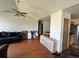 An open-concept space featuring a living room, dining area, and kitchen at 780 2Nd St, Bennett, CO 80102