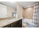 Basement bathroom with granite countertop and bathtub at 9066 Sandpiper Dr, Frederick, CO 80504