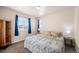 Bedroom with a queen-size bed and plenty of natural light at 9066 Sandpiper Dr, Frederick, CO 80504