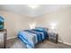 Cozy basement bedroom with a queen-size bed and ample space at 9066 Sandpiper Dr, Frederick, CO 80504