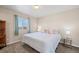 Spacious bedroom with king-size bed and plenty of natural light at 9066 Sandpiper Dr, Frederick, CO 80504