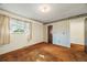 Inviting bedroom with soft carpet, a window with view, and a closet at 4445 S Lowell Blvd, Denver, CO 80236