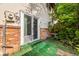 Back patio featuring a sliding glass door and unique outdoor space at 4445 S Lowell Blvd, Denver, CO 80236