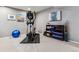 Basement gym with exercise equipment and plenty of storage at 8656 Aberdeen Cir, Highlands Ranch, CO 80130