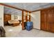 Basement featuring a seating area, built-in shelves, and storage closets under a decorative ceiling at 455 Greenwood, Longmont, CO 80504
