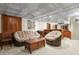Finished basement featuring decorative ceilings, comfortable seating, and a bar area at 455 Greenwood, Longmont, CO 80504
