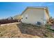 Backyard featuring a grassy area and a wooden fence at 47341 Lily Ave, Bennett, CO 80102