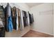 Walk-in closet with white wire shelving for organized storage at 47341 Lily Ave, Bennett, CO 80102