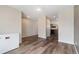 Neutral dining area featuring wood-look floors, perfect for Gathering meals and entertaining guests at 47341 Lily Ave, Bennett, CO 80102
