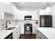 Bright kitchen with white cabinets and stainless steel appliances at 6780 Meade Cir # B, Westminster, CO 80030