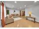 Spacious living room featuring neutral decor, wood floors, and abundant natural light at 6769 W 70Th Ave, Arvada, CO 80003