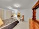 Inviting main bedroom with a cozy fireplace, seating area, and ample closet space at 6769 W 70Th Ave, Arvada, CO 80003