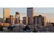Wonderful view of the Denver skyline from this apartment listing with tall buildings and the rocky mountains in the background at 800 N Washington St # 710, Denver, CO 80203