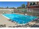 Community swimming pool on a sunny day with lounge chairs and landscaped surroundings for ultimate relaxation at 800 N Washington St # 710, Denver, CO 80203