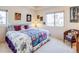 Bright bedroom featuring natural light and comfortable seating area at 12 Canon Cir, Greenwood Village, CO 80111