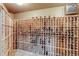 Custom wine cellar with extensive wooden racking, providing optimal storage for a large wine collection at 12 Canon Cir, Greenwood Village, CO 80111