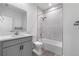 Neutral bathroom featuring a shower-over-tub, vanity and toilet at 2347 Kite Route Ln, Superior, CO 80027