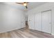 Bedroom with a ceiling fan, closet, and access to the hallway at 2347 Kite Route Ln, Superior, CO 80027
