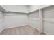 Walk-in closet with ample storage space and shelving at 1349 Brookfield Pl, Erie, CO 80026