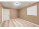 Cozy bedroom featuring plush carpet, a window for natural light, and a neutral color scheme at 16486 W 94Th Dr, Arvada, CO 80007
