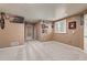 Spacious bonus room with carpet flooring, neutral walls, and overhead recessed lighting at 16486 W 94Th Dr, Arvada, CO 80007