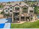 Luxury estate with large backyard, sport court and multiple balconies at 10887 Rainribbon Rd, Highlands Ranch, CO 80126