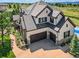 Luxury home with two car garage and landscaping at 10887 Rainribbon Rd, Highlands Ranch, CO 80126