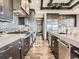 Modern kitchen features stainless steel appliances and ample cabinetry at 10887 Rainribbon Rd, Highlands Ranch, CO 80126