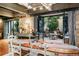 Dining room showcasing table setting leading to an outdoor living area at 2000 Little Raven St # 1B, Denver, CO 80202