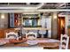 Kitchen with counter seating, stainless steel appliances, and open layout at 2000 Little Raven St # 1B, Denver, CO 80202