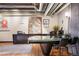 Well-appointed office space featuring hardwood floors, custom desk, and stylish decor in a modern aesthetic at 2000 Little Raven St # 1B, Denver, CO 80202