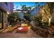 Inviting outdoor space with lounge chairs and lush landscaping perfect for relaxation and entertaining at 2000 Little Raven St # 1B, Denver, CO 80202