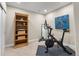Home gym with exercise equipment and ample space for fitness activities and a healthy lifestyle at 7746 E Severn Pl, Denver, CO 80230