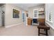 Office space featuring custom built-ins, a comfortable chair, and ample natural light at 7746 E Severn Pl, Denver, CO 80230