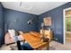 Stylish office area with a sleek desk, providing an efficient workspace for productivity and focus at 7746 E Severn Pl, Denver, CO 80230