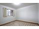 Bright bedroom with a window and neutral carpet at 3222 Fenton St, Wheat Ridge, CO 80212