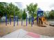 Community playground with various play structures at 3222 Fenton St, Wheat Ridge, CO 80212