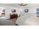 Bedroom featuring plush carpet, a mounted television, and elegant furniture at 2320 Morningview Ln, Castle Rock, CO 80109