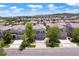 A street view of homes featuring a two-car garage, small lawns and an inviting neighborhood setting at 2320 Morningview Ln, Castle Rock, CO 80109