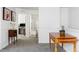 Hallway boasts neutral carpeting, and provides access to an office and bathroom at 2320 Morningview Ln, Castle Rock, CO 80109