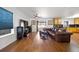 Bright living room with hardwood floors and a sliding door to the outdoor patio at 2320 Morningview Ln, Castle Rock, CO 80109