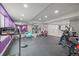 Spacious gym features full mirrors and fitness equipment on rubber flooring at 14341 Beebalm Loop, Parker, CO 80134