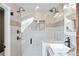Modern bathroom featuring dual shower heads, frameless glass, and stylish tile accents at 2927 N Humboldt St, Denver, CO 80205