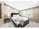 Comfortable bedroom featuring neutral colors and ample natural light at 2927 N Humboldt St, Denver, CO 80205