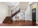 Open entryway showcasing staircase and built-in storage at 2927 N Humboldt St, Denver, CO 80205