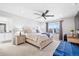 Bright and spacious main bedroom with a ceiling fan, ensuite bathroom and a window at 610 Mosquito St, Elizabeth, CO 80107
