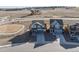 View of two homes showcasing their architectural details and landscaping in a neighborhood setting at 610 Mosquito St, Elizabeth, CO 80107