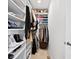Organized walk-in closet with shelving, hanging racks, and ample space for storage at 610 Mosquito St, Elizabeth, CO 80107